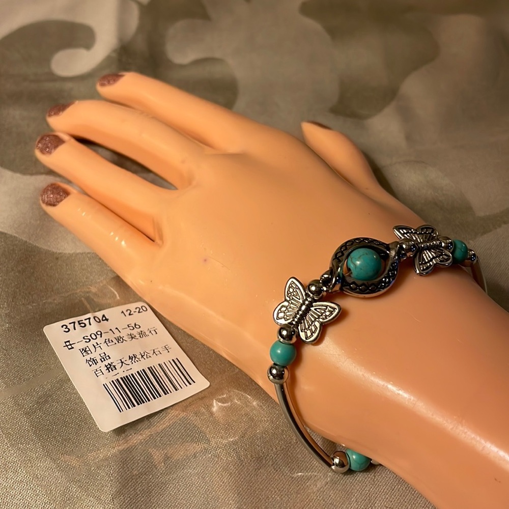 New with tags-Silver colored bracelet with turquoise and butterflies